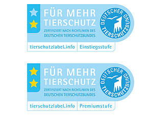 Die beiden Labels „Für Mehr Tierschutz“ mit einem Stern (Einstiegsstufe) bzw. zwei Sternen (Premiumstufe).  