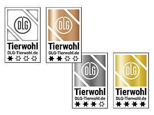 Die vier Labels „DLG-Tierwohl“ in Weiß, Bronze, Silber und Gold.  